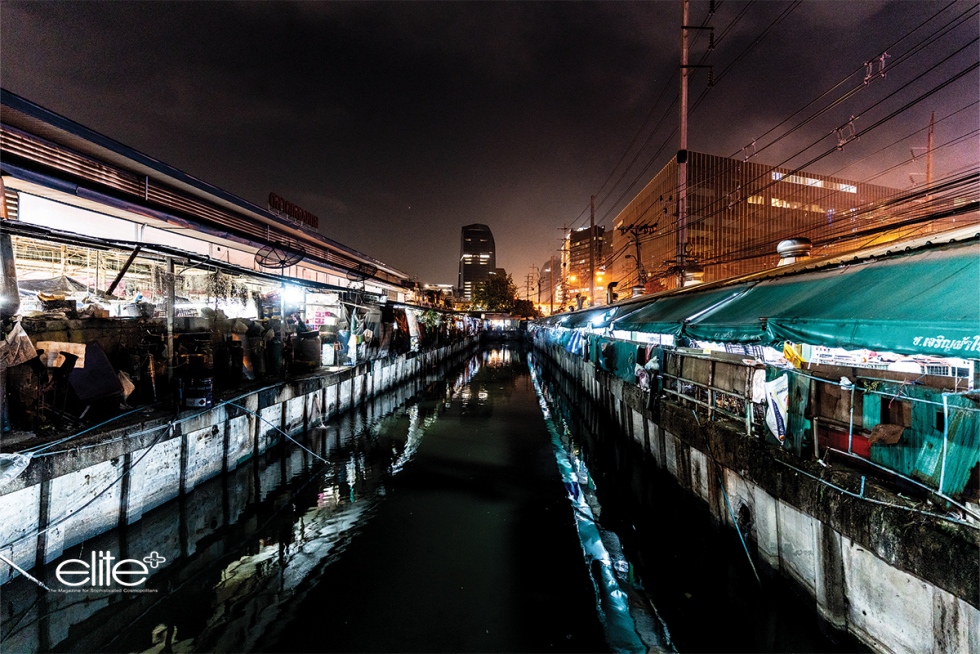 The Chao Phraya River and a Khlong Toei canal, full of colour after dark.