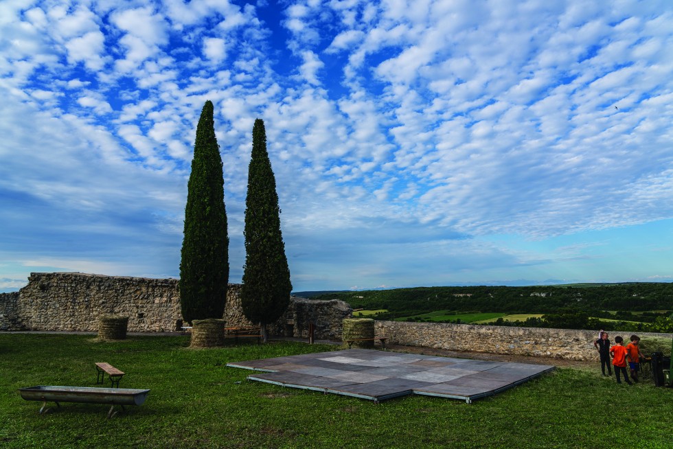 Fortress and cypresses in the nearby town of Lussan.