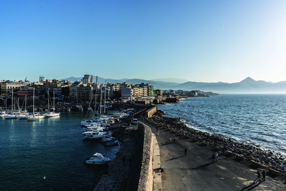 A causeway protects the port and city from tidal disruptions.